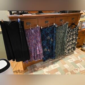 Ladies stretch poly skirts M/L ( group)